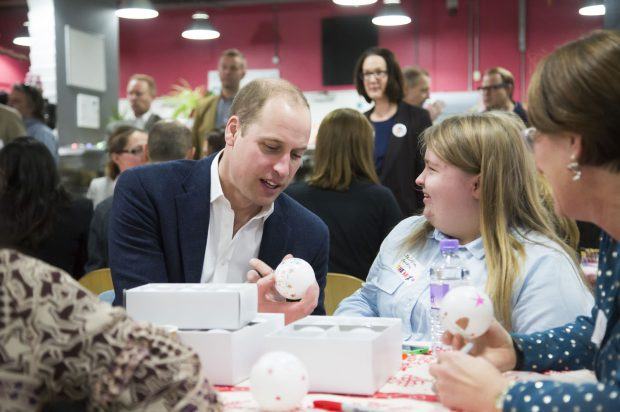 HRH The Duke of Cambridge talks with Jessica, one of The Mix's incredible volunteers