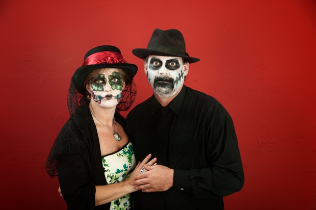 Middle-aged couple in gothic clothing and make-up