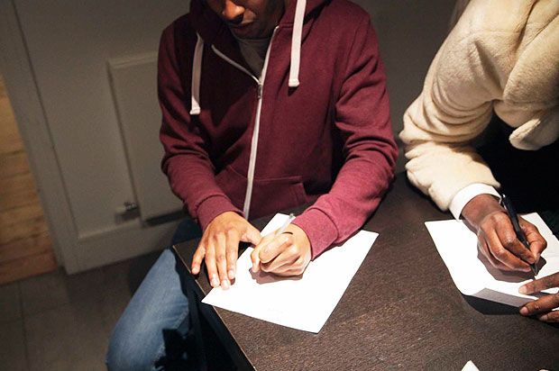 boy signing contract