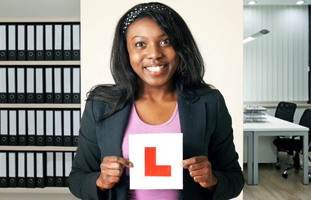 Girl holding an L plate