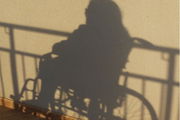 Shadow of a girl in a wheelchair