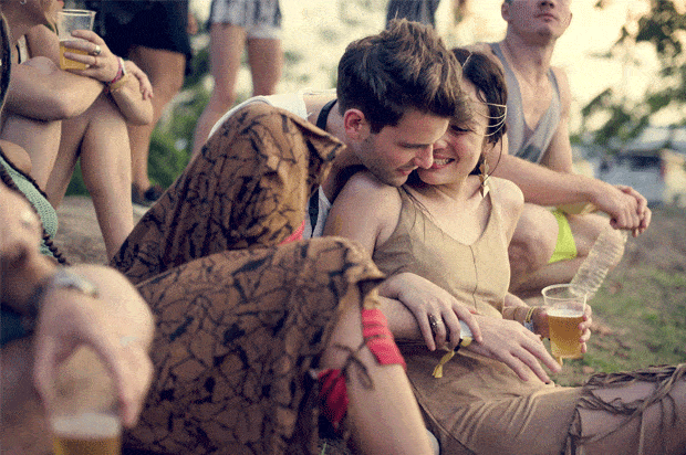 couple cuddling at a festival