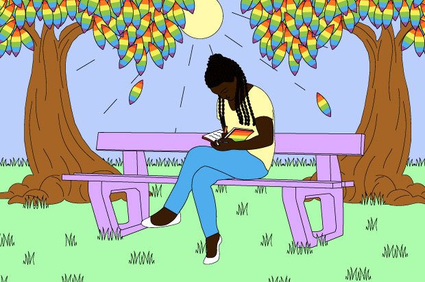A young person sits on a bench writing in a notebook. The leaves in the trees above them are rainbow coloured.